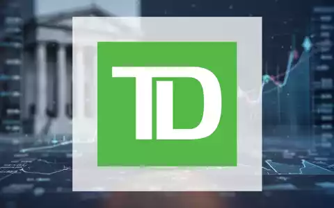 Eine Nahaufnahme einer kanadischen Dollarmünze, umgeben von abstrakten Finanzdaten, die die Berichterstattung der Toronto-Dominion Bank widerspiegeln. - Foto: über boerse-global.de