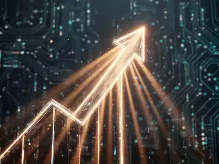 Ein stilisierter, nach oben zeigender Pfeil aus Lichtstrahlen vor einem Hintergrund aus digitalen Schaltkreisen, der Technologie und Wachstum symbolisiert. - Foto: über boerse-global.de