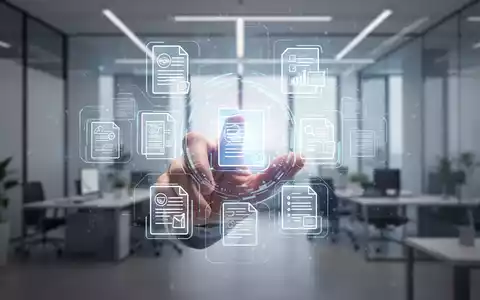 A hand interacting with a holographic interface showing document icons and digital templates in a modern office. - Foto: über boerse-global.de
