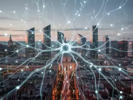 A futuristic neural network overlays a modern Madrid skyline, symbolizing AI expansion and technological integration in Spain. - Foto: über boerse-global.de
