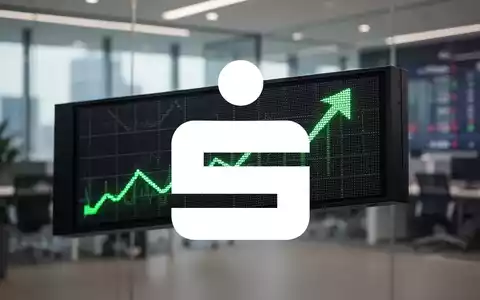 Nahaufnahme eines modernen Börsentickers mit Finanzdaten, im Hintergrund ein unscharfes Bankbüro. - Foto: über boerse-global.de