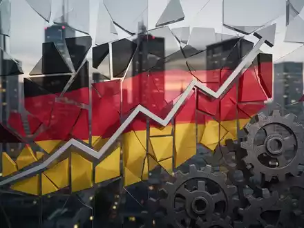 Eine stilisierte, fragmentierte deutsche Flagge aus geometrischen Formen, teilweise verdeckt von einem aufsteigenden Diagramm und Zahnrädern. - Foto: über boerse-global.de