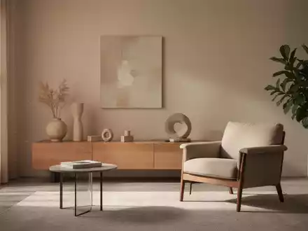 Ein minimalistisches Wohnzimmer mit sanftem Licht und warmen Farbtönen, das Ruhe und Ordnung ausstrahlt. - Foto: über boerse-global.de