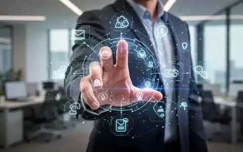 Eine Hand schiebt eine leuchtende digitale Schnittstelle weg, die KI und digitale Aufgaben darstellt, in einem modernen Büroumfeld. - Foto: über boerse-global.de