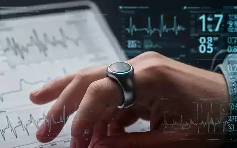 Nahaufnahme eines modernen, manschettenlosen Blutdruckmessgeräts an einem Finger, mit verschwommenen medizinischen Diagrammen im Hintergrund. - Foto: über boerse-global.de