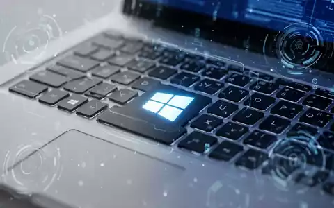 A close-up of a laptop keyboard showing the Windows logo key, surrounded by glowing blue digital interface elements. - Foto: über boerse-global.de