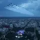 Ein Jet-Überflug ist Teil des Spektakels.  - Bild: Win McNamee/Pool Getty/AP/dpa