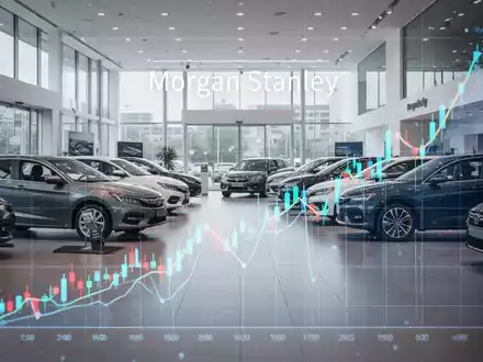 Ein modernes Autohaus mit hell beleuchteten Neu- und Gebrauchtwagen und einem digitalen Aktienchart, der einen Aufwärtstrend zeigt. - Foto: über boerse-global.de