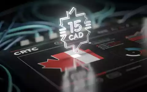 Eine Nahaufnahme des CRTC-Logos auf einem Bildschirm mit einem stilisierten 15-CAD-Gebührensymbol und verschwommenen Netzwerkkabeln im Hintergrund. - Foto: über boerse-global.de
