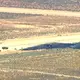 Das US-Militär rechnet nach dem Absturz nicht mit Überlebenden. - Bild: Uncredited/KABC/AP/dpa
