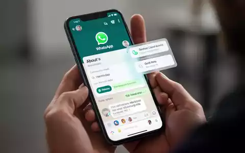 A close-up of a smartphone screen showing the WhatsApp app with its redesigned 'About' section and new floating message menu. - Foto: über boerse-global.de