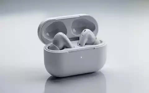 Sleek white wireless earbuds and their round charging case on a reflective surface, emphasizing a minimalist design. - Foto: über boerse-global.de
