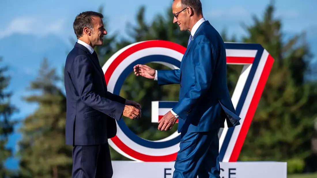 Macron und Merz spielen eine wesentliche Rolle bei der Vorbereitung des Einsatzes. - Bild: Michael Kappeler/dpa-Pool/dpa