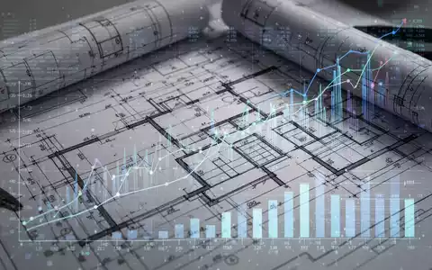 Bauplan, Finanzdiagramme und digitale Daten symbolisieren Immobilieninvestitionen, Steuerregelungen und digitale Verarbeitung. - Foto: über boerse-global.de