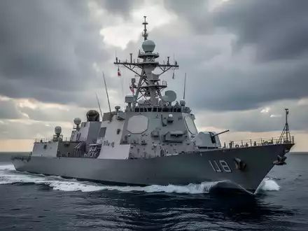 Ein modernes Marineschiff mit fortschrittlichen Radarsystemen auf See unter einem dramatischen Himmel. - Foto: über boerse-global.de