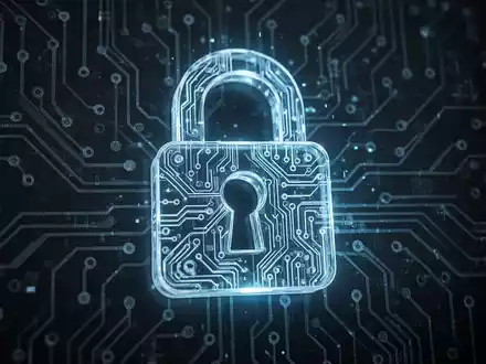 A stylized, glowing blue digital lock icon on a dark background with subtle circuit board patterns, symbolizing cybersecurity and updates. - Foto: über boerse-global.de