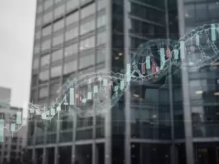 Ein leicht fallender Börsenkursgraph über abstrakten Gesundheitsmotiven mit einem unscharfen Bürogebäude im Hintergrund. - Foto: über boerse-global.de