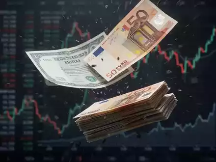 Ein Bündel Euro-Banknoten oder eine einzelne Aktienurkunde fällt schnell nach unten, vor dem Hintergrund eines verschwommenen, fallenden Finanzdiagramms. - Foto: über boerse-global.de