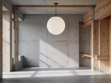 Ein minimalistischer Innenraum mit einer sphärischen Pendelleuchte, klaren Linien und der bewussten Darstellung von Materialehrlichkeit in Design und Architektur. - Foto: über boerse-global.de