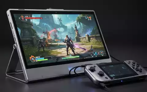 A portable monitor displaying a video game, connected to a handheld gaming PC like a Steam Deck, on a desk. - Foto: über boerse-global.de