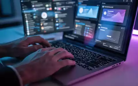 Close-up of hands typing on a laptop keyboard with blurred, colorful application windows on the screen, symbolizing productivity. - Foto: über boerse-global.de
