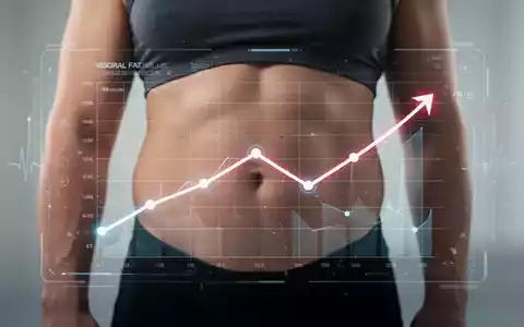Eine Person mit einer subtilen digitalen Anzeige, die eine Verbesserung der Gesundheit und die Reduzierung von viszeralem Fett symbolisiert. - Foto: über boerse-global.de