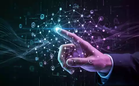 A human hand interacts with a glowing, holographic interface showing abstract data and interconnected nodes, symbolizing AI and automation. - Foto: über boerse-global.de