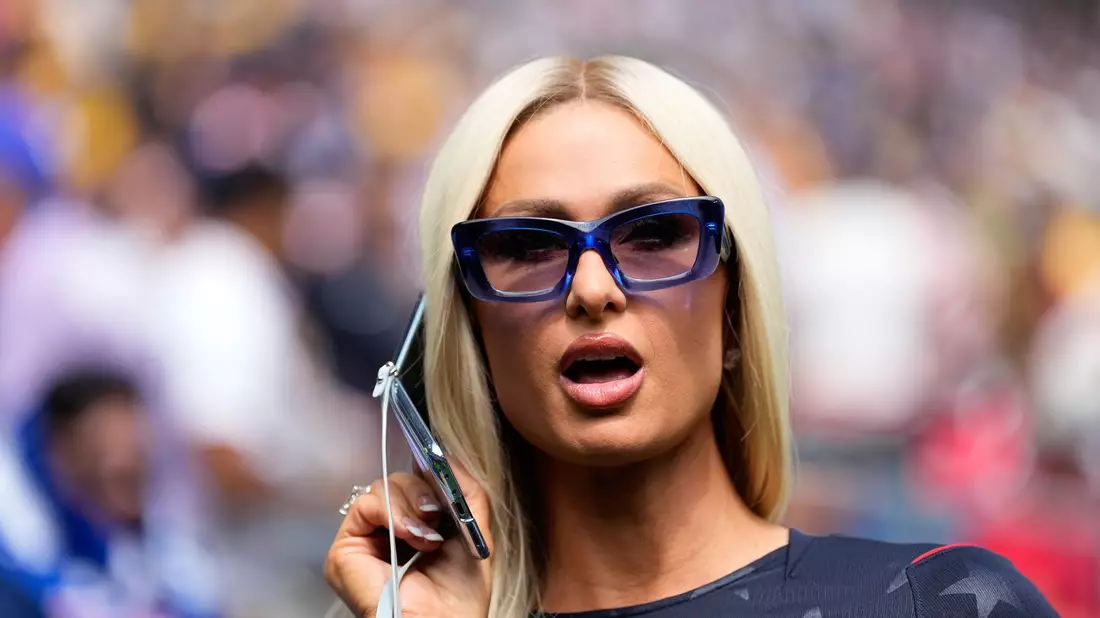 Hilton war eine von vielen Prominenten beim Spiel der USA. - Bild: Lindsey Wasson/AP/dpa