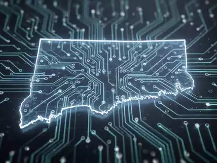 Eine stilisierte, leuchtende Leiterplatte mit einer schwachen Umrisslinie des Bundesstaates Connecticut, die KI-Regulierung darstellt. - Foto: über boerse-global.de