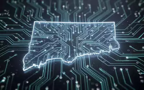 Eine stilisierte, leuchtende Leiterplatte mit einer schwachen Umrisslinie des Bundesstaates Connecticut, die KI-Regulierung darstellt. - Foto: über boerse-global.de