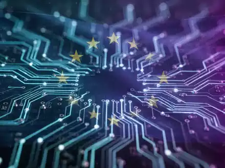 Close-up of a glowing, futuristic circuit board with digital code overlay, symbolizing AI regulation and compliance. - Foto: über boerse-global.de