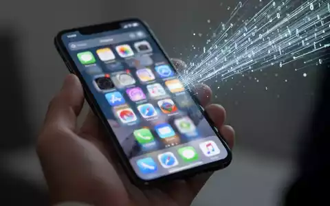 Hand holding an iPhone displaying the App Store, with a subtle visual effect suggesting data transmission from the device. - Foto: über boerse-global.de