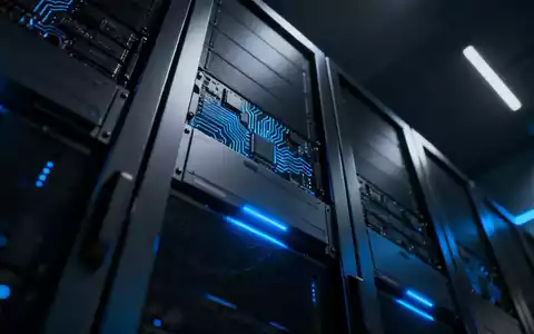 Ein modernes Rechenzentrum mit leuchtenden Server-Racks, die fortschrittliche Technologie und Finanzberichte symbolisieren. - Foto: über boerse-global.de