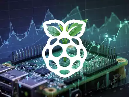 Nahaufnahme einer leuchtenden Raspberry Pi Platine mit abstrakten Finanzdiagrammen im Hintergrund, die Technologie und Wachstum symbolisieren. - Foto: über boerse-global.de