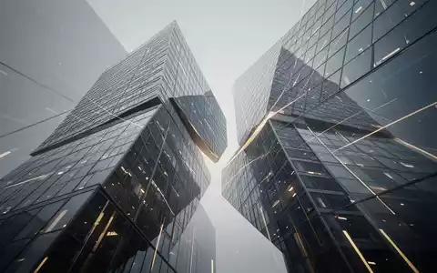 Zwei abstrakte, moderne Gebäude oder Strukturen, die eine Finanzfusion zwischen Banken symbolisieren, mit Fokus auf strategische Bewegung. - Foto: über boerse-global.de