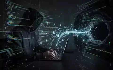 A shadowy figure in a hoodie typing on a laptop, surrounded by glowing lines of code and digital data streams, symbolizing a cyberattack. - Foto: über boerse-global.de