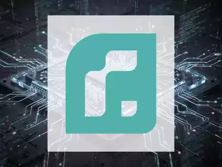Ein futuristischer Quantencomputer-Chip mit leuchtenden Schaltkreisen vor einem dunklen, technologischen Hintergrund. - Foto: über boerse-global.de