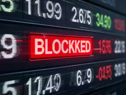 Verwischtes Börsenticker-Display mit rotem 'blockiert'-Indikator, der eine Handelsunterbrechung symbolisiert. - Foto: über boerse-global.de