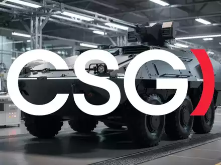 Modernes gepanzertes Fahrzeug in einer Produktionshalle, symbolisiert die Kooperation zwischen CSG und Ukrainian Armor. - Foto: über boerse-global.de