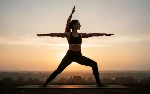 Eine Frau in einer Yoga-Pose bei Sonnenaufgang, die Flexibilität und innere Ruhe ausstrahlt. - Foto: über boerse-global.de