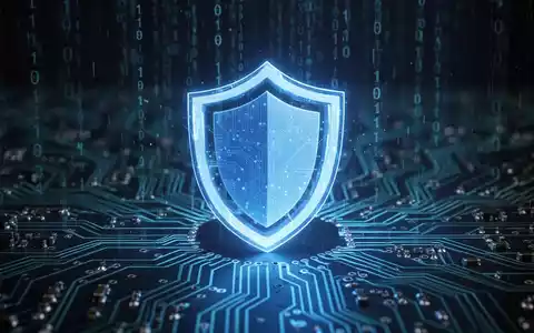 A glowing blue shield icon over a circuit board with binary code, symbolizing digital security and data protection. - Foto: über boerse-global.de