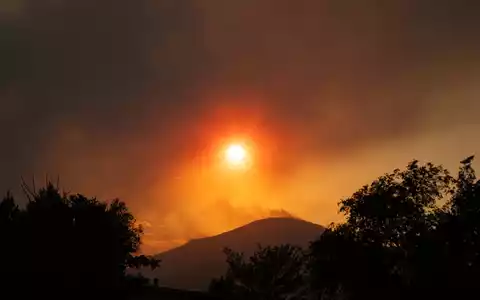 Ein Waldbrand in Utah hat sich weiter ausgebreitet. - Foto: Charles Mcclintock Wilson/ZUMA Press Wire/dpa