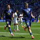 Kerim Alajbegovic (r.) brachte Bosnien-Herzegowina in Führung. - Bild: Lindsey Wasson/AP/dpa