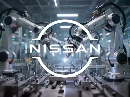 Abstrakte Darstellung einer hochmodernen Fabrik mit verschwommenen Industrierobotern und Maschinen, die Innovation und Automatisierung symbolisieren. - Foto: über boerse-global.de