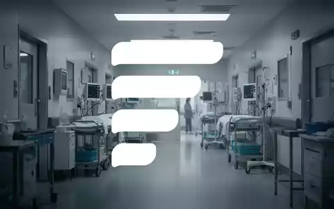 Eine sterile, moderne medizinische Umgebung mit gedämpfter Beleuchtung, die Vorsicht und Verlangsamung andeutet. - Foto: über boerse-global.de