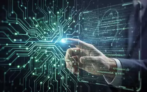 Stilisierte Darstellung einer menschlichen Hand, die mit einer leuchtenden, futuristischen holografischen Schnittstelle interagiert, die KI-Training und Unternehmensberatung symbolisiert. - Foto: über boerse-global.de