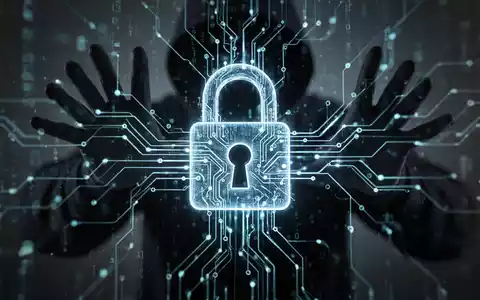 Nahaufnahme eines digitalen Schlosses, umgeben von einem leuchtenden Datennetz, mit dem Schatten einer Hackerhand im Hintergrund. - Foto: über boerse-global.de
