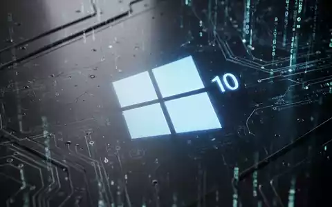 Leuchtendes Windows-10-Logo auf dunkler Metallfläche, umgeben von dezenten digitalen Sicherheitsmustern. - Foto: über boerse-global.de