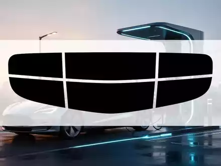 Eine futuristische Ladestation für Elektrofahrzeuge im Morgengrauen, die Innovation und globales Wachstum im Automobilsektor symbolisiert. - Foto: über boerse-global.de