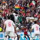 Ein paar Regenbogenfahnen waren auf der Tribüne zu sehen. - Bild: Lindsey Wasson/AP/dpa